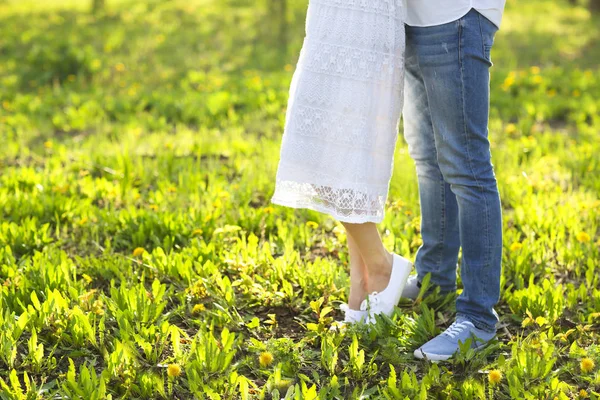 Young couple in love kissing and hugging in nature — Stock Photo, Image