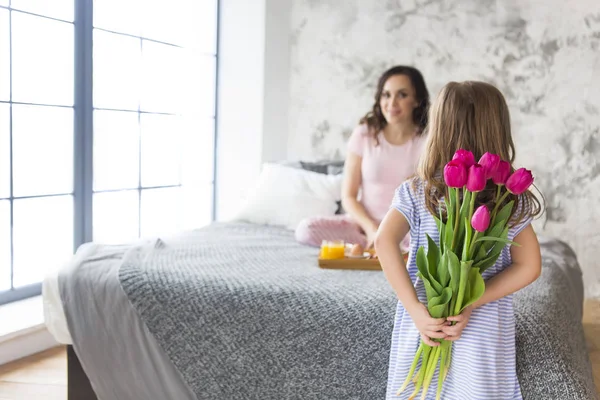 Young woman in the morning with small girl — Stock Photo, Image