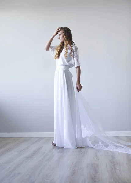 Young pretty blond woman wearing wedding dress — Stock Photo, Image