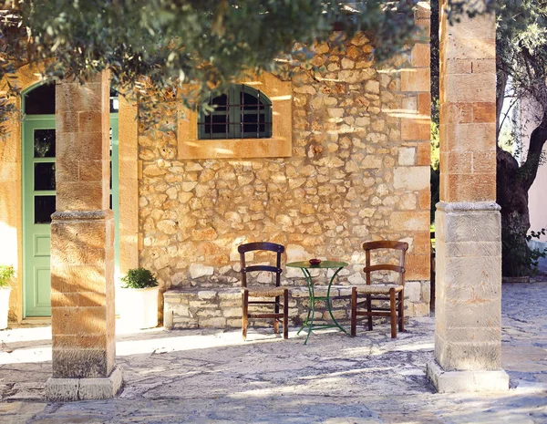 Old porch and yard with olive tree — Stock Photo, Image