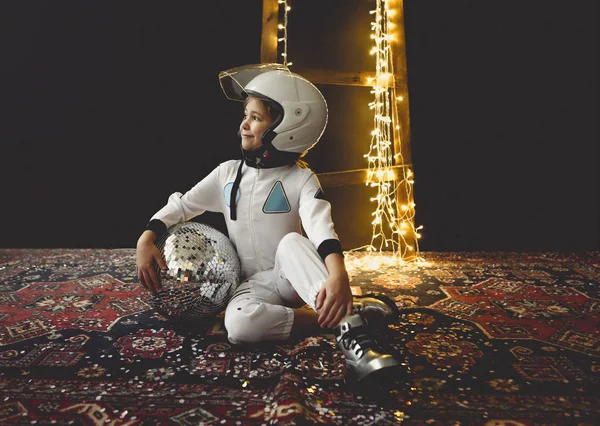 Astronaut futuristic kid girl with white full length uniform and — Stock Photo, Image