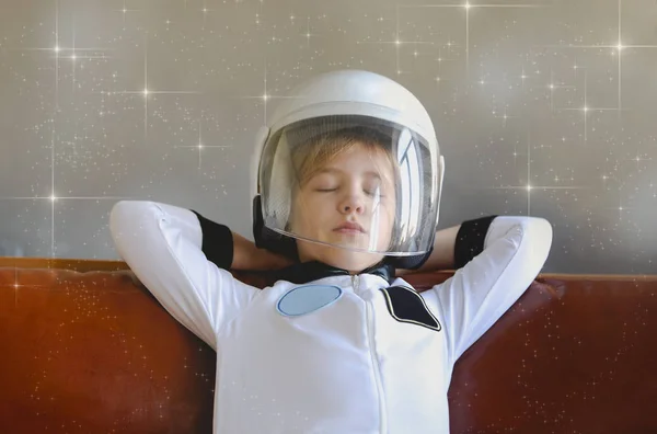 Astronaut futuristic kid girl with white full length uniform and — Stock Photo, Image