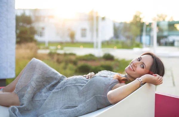 Happy Pregnant Female Touching Belly Gently While Relaxing Park Sunset — Stock Photo, Image