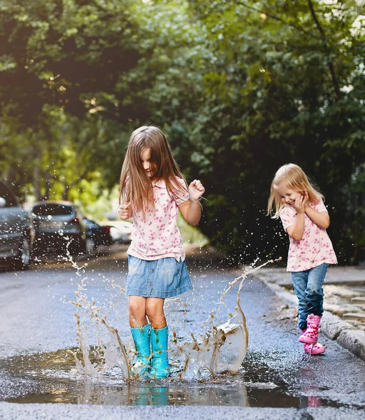 Full Body Little Girl Rain Boots Jumping Puddle Water Laughing — Stock Photo, Image