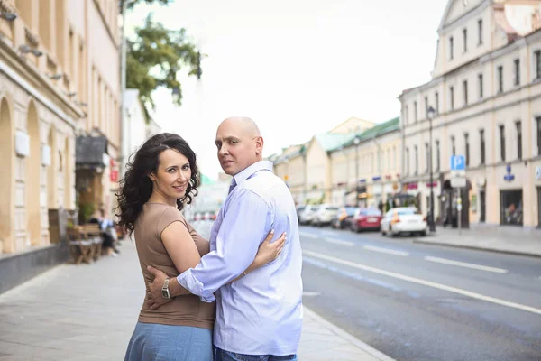 Bald Male Embracing Happy Wife Expectancy Looking Each Other Street — Stock Photo, Image