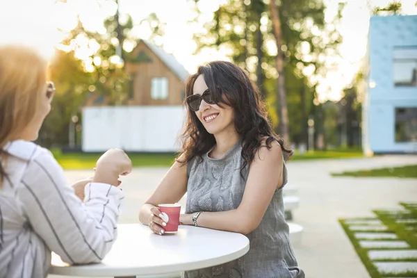 Smiling Blond Meeting Female Friend Cafe Having Refreshing Drinks Together — Stock Photo, Image