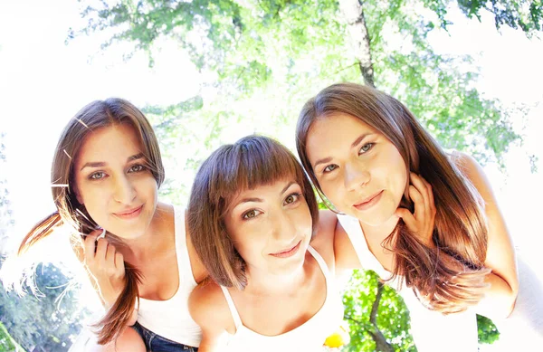 Positive Young Female Friends Casual Outfit Embracing Looking Camera While — Stock Photo, Image