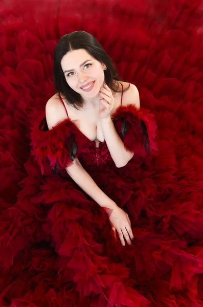 Lying Beautiful Young Brunette Female Luxurious Red Evening Gown Looking — Stock Photo, Image