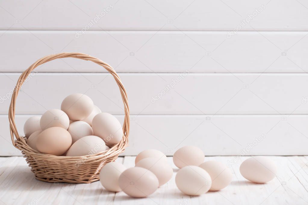 eggs on white wooden background