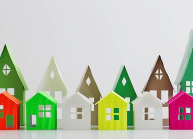 beyaz zemin üzerine kağıt evi