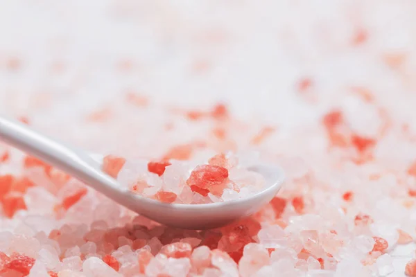 Himalayan salt on white wooden background — Stock Photo, Image