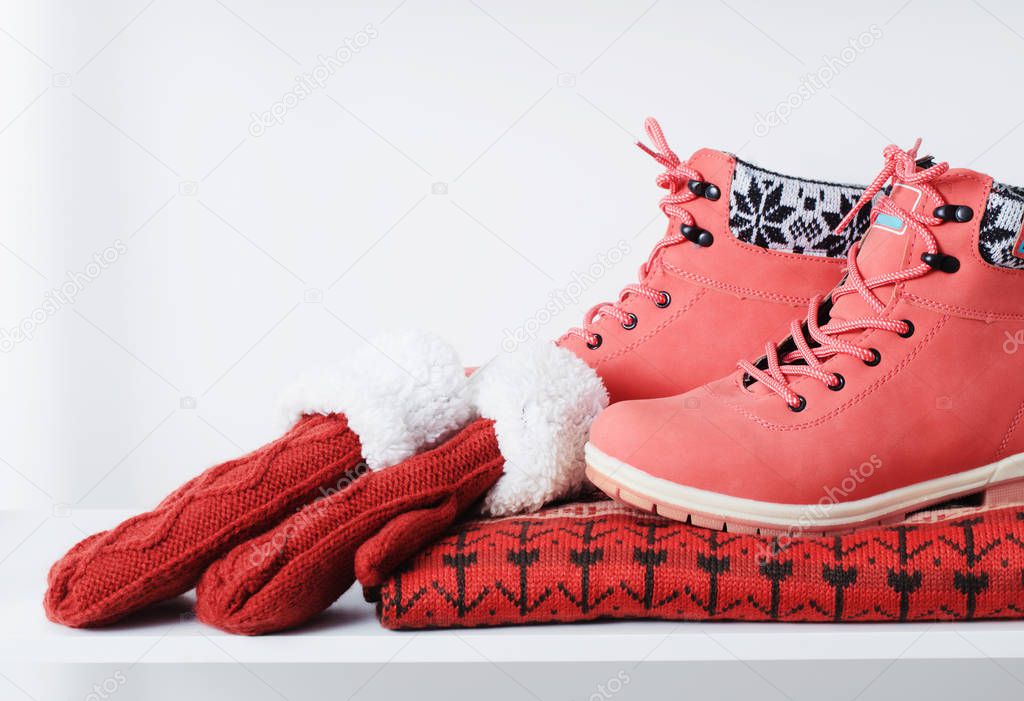 beautiful winter female clothes and shoes on white background