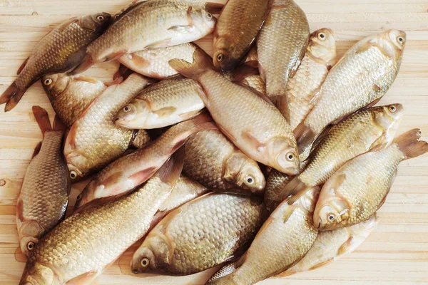 River raw fish on wooden table — Stock Photo, Image