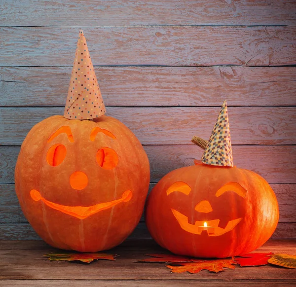 Halloween pumpkin on blue wooden background — Stock Photo, Image