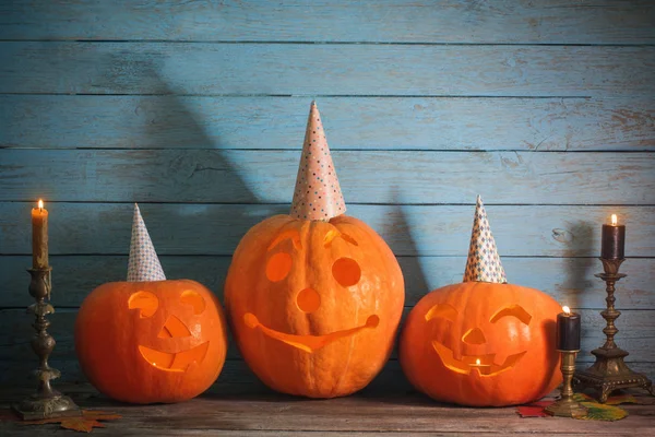 Halloween pumpkin on blue wooden background — Stock Photo, Image