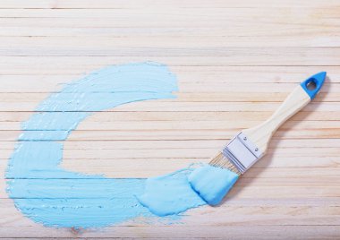 ahşap arka plan üzerinde boya ile fırça