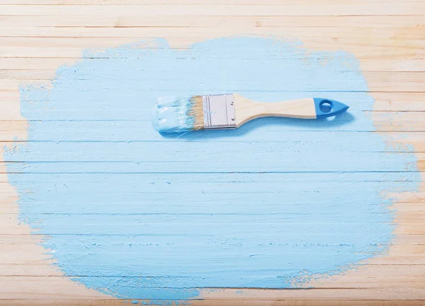 ahşap arka plan üzerinde boya ile fırça