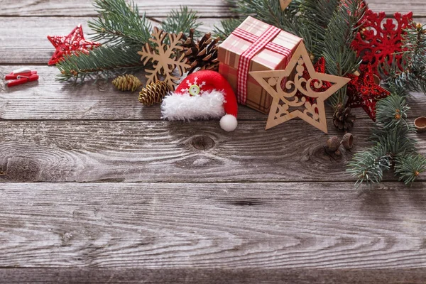 Christmas composition on old wooden background — Stock Photo, Image
