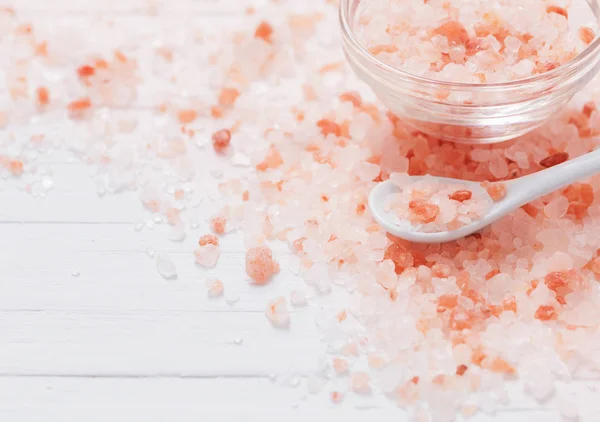 Himalayan salt on white wooden background — Stock Photo, Image