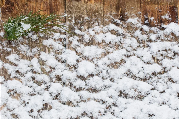 Oude houten besneeuwde achtergrond — Stockfoto