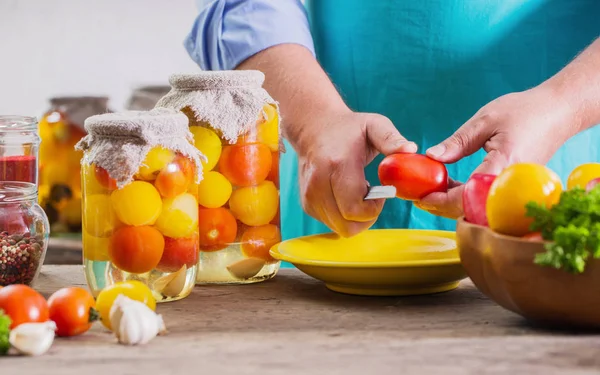 Man with tomatoes in jar — Stock Image Man Tomatoes Jar Stock Image