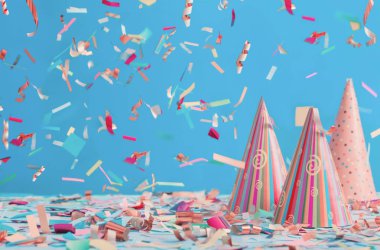 doğum günü şapkası ve mavi zemin üzerine konfeti