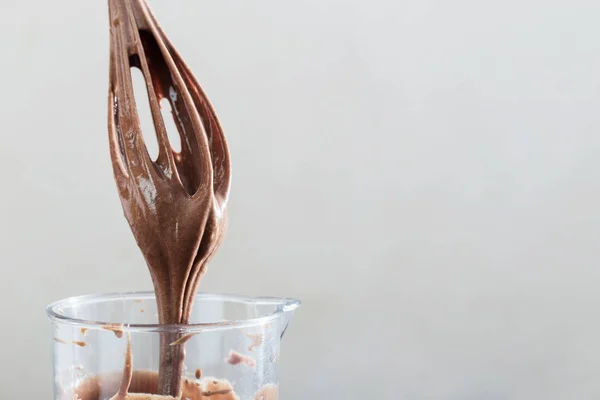 Chocolate dough in a mixer — Stock Photo, Image