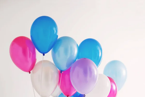 Balloons on white wooden background — Stock Photo, Image