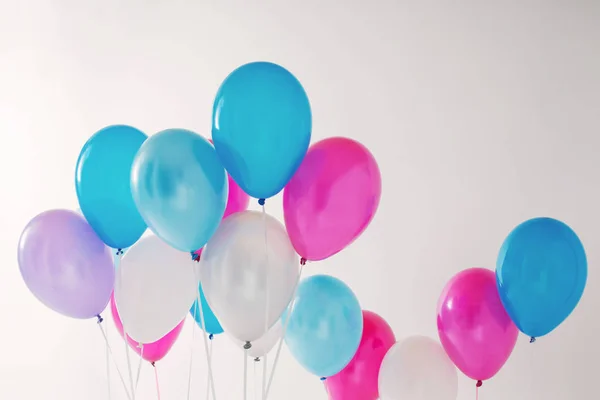 Balloons on white wooden background — Stock Photo, Image