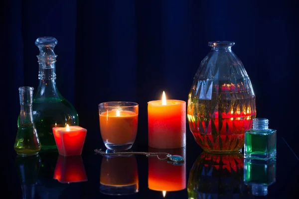 Magic potions on a blue background — Stock Photo, Image