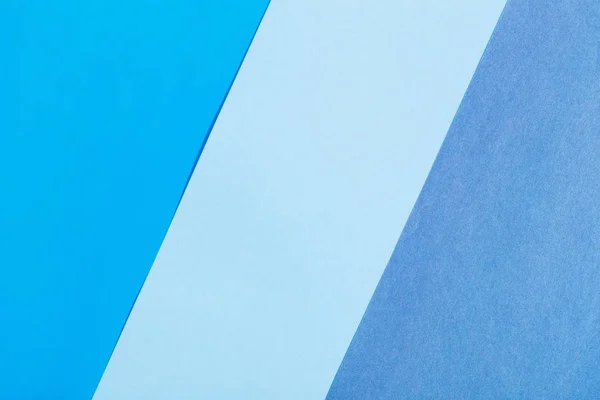 Blauer und hellblauer Papierhintergrund — Stockfoto
