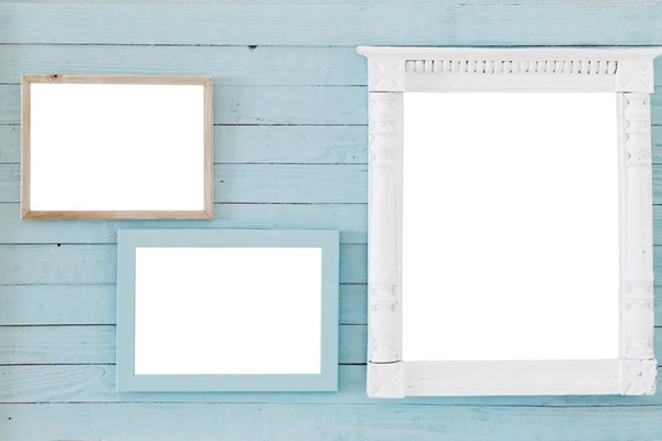 Wooden frame on background old blue wall — Stock Photo, Image