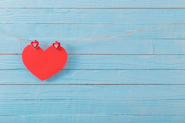 Red paper heart on old wooden background — Stock Photo, Image