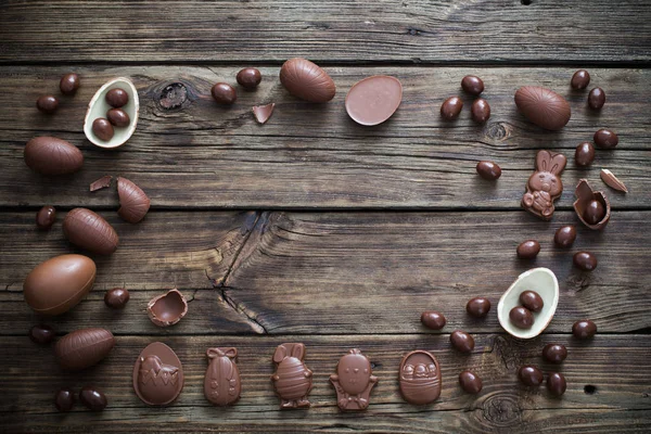 Chocolate eggs on dark wooden background — Stock Photo, Image