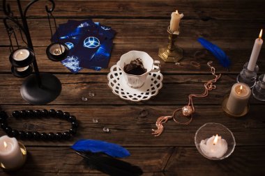 fortune-telling with  cup of coffee and fortune-telling cards on