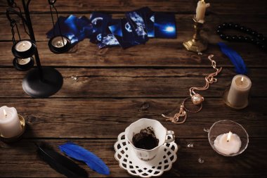 fortune-telling with  cup of coffee and fortune-telling cards on