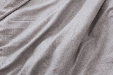 Gri keten çarşaf yüzeyinden arkaplan