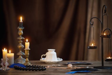 fortune-telling with  cup of coffee and fortune-telling cards on old wooden table