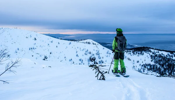 Young man on splitboard — Stock Photo, Image