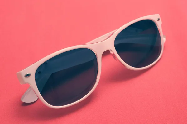 Retro Style Sunglasses White Frame Dark Lens Pink Color Background — Stock Photo, Image