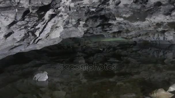 Underground stream in karst cave — Stock Video