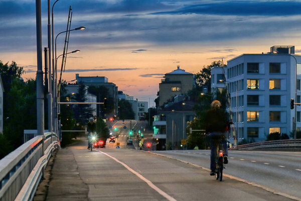 Cycling in evening city