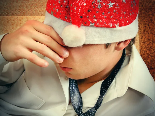 Smutny nastolatek w Santa Hat — Zdjęcie stockowe