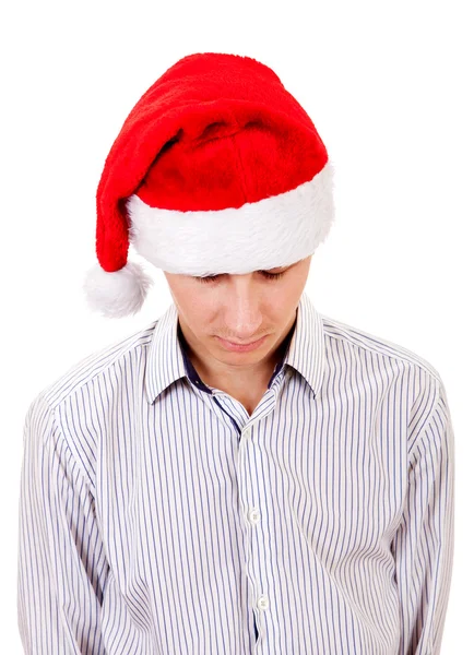 Sad Young Man in Kerstman hoed — Stockfoto