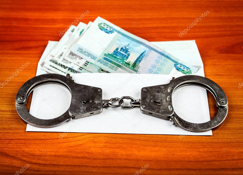 Russian Rubles and Handcuffs