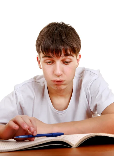 Estudante cansado com um livro — Fotografia de Stock