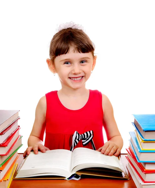 Malá dívka knihami — Stock fotografie