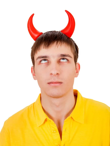 Молодой человек с дьявольскими рогами — стоковое фото
