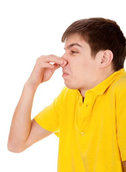 Joven siente un hedor — Foto de Stock