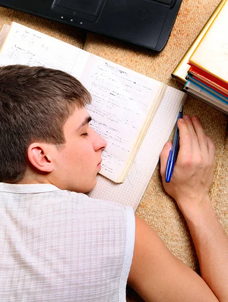 Teenager schlafen mit einem Buch — Stockfoto